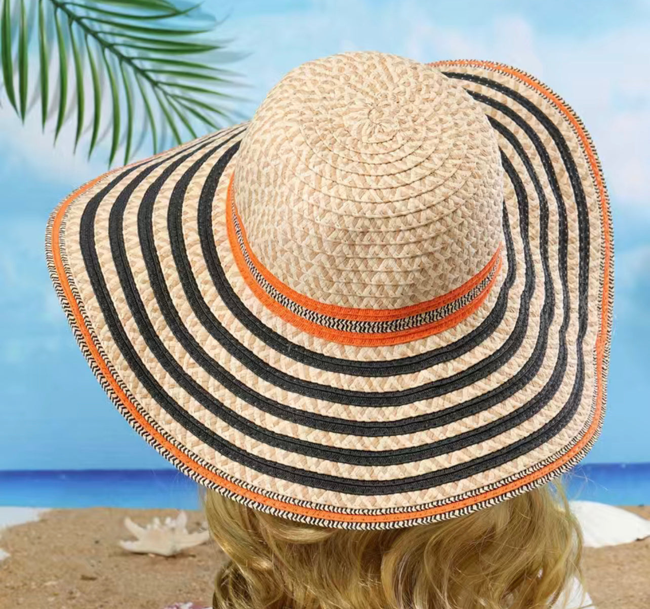Floppy, orange, striped sun hat