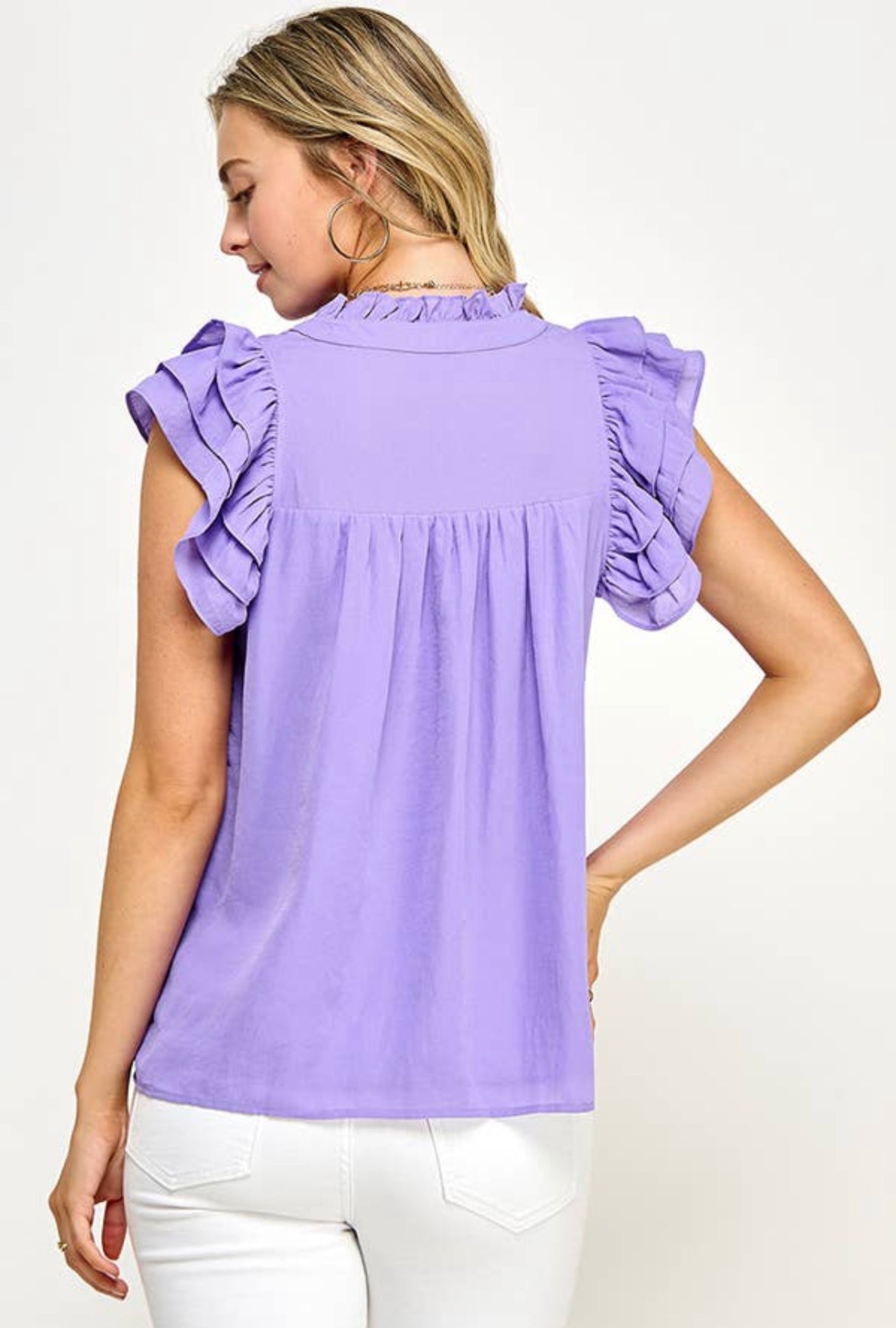 V-neck line blouse partially lined with ruffle sleeve